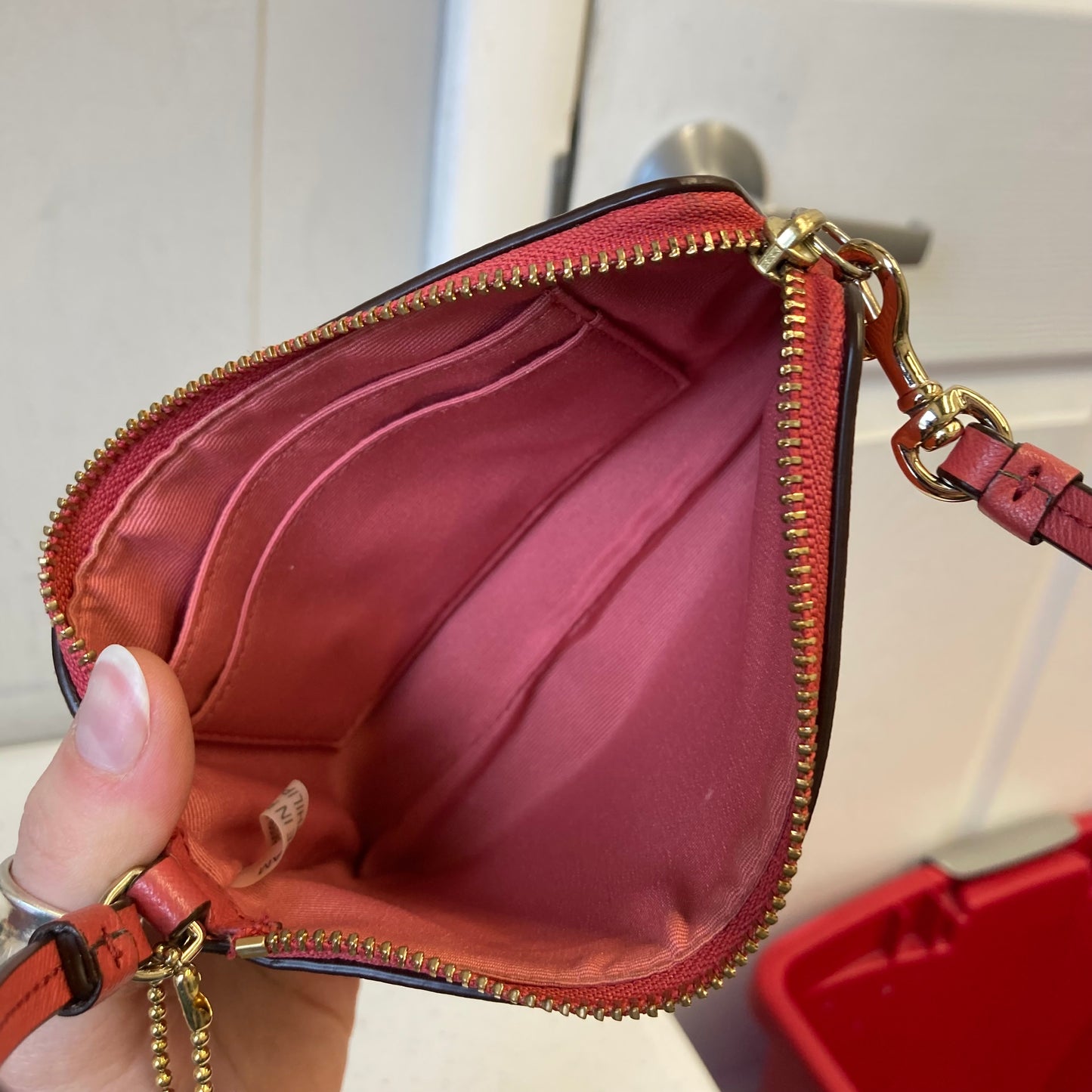 Wristlet Designer By Coach In Coral, Size:Small