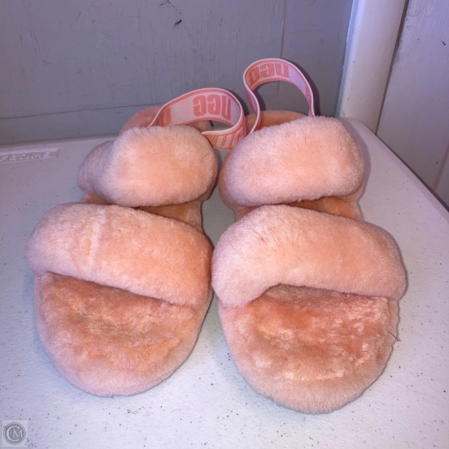 Slippers Designer By Ugg In Peach, Size: 9